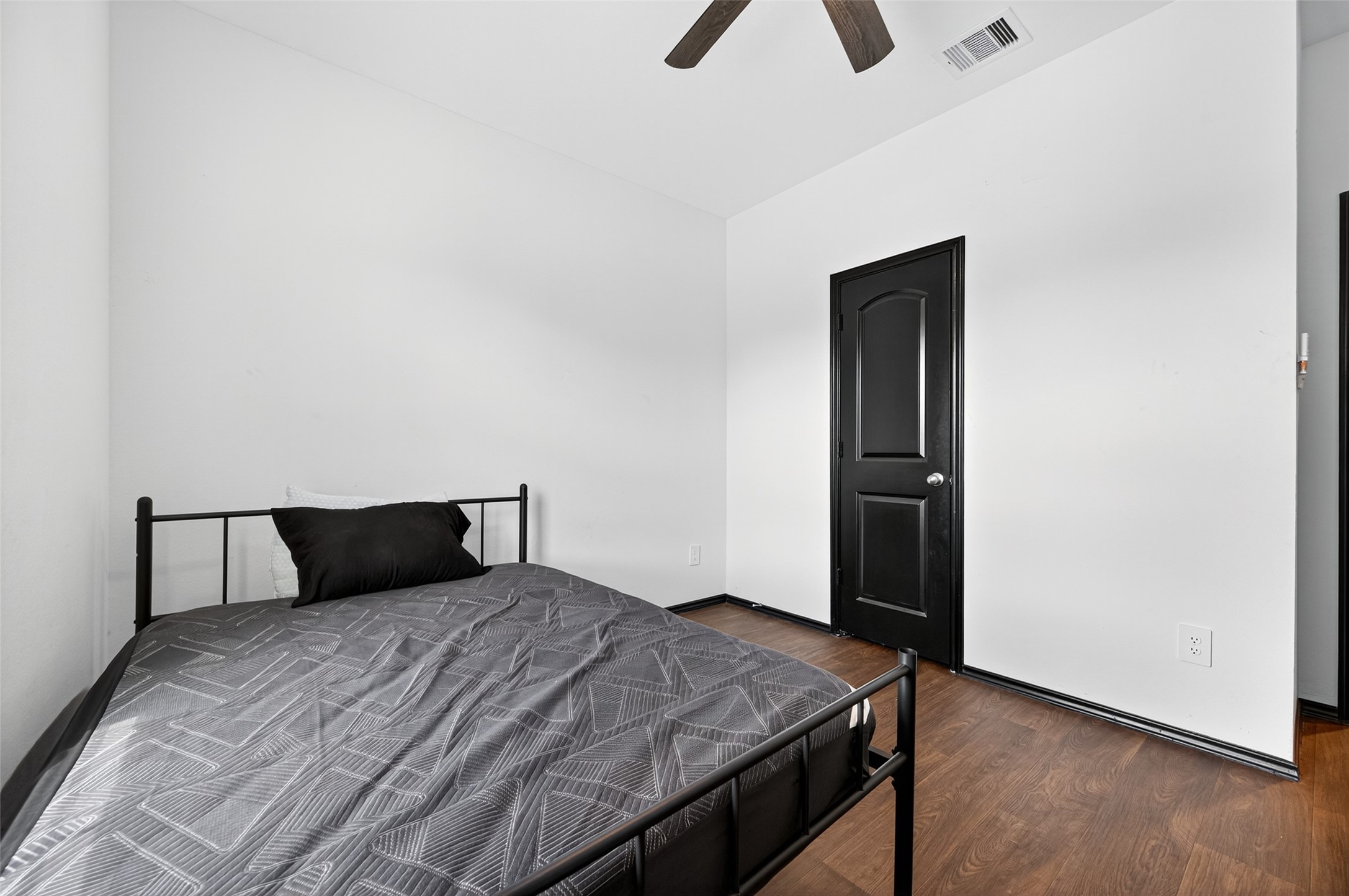 21538 Violet Rdg Road Katy, TX 77449 - Photo 6 of 39 a bedroom with a bed and painting on the wall