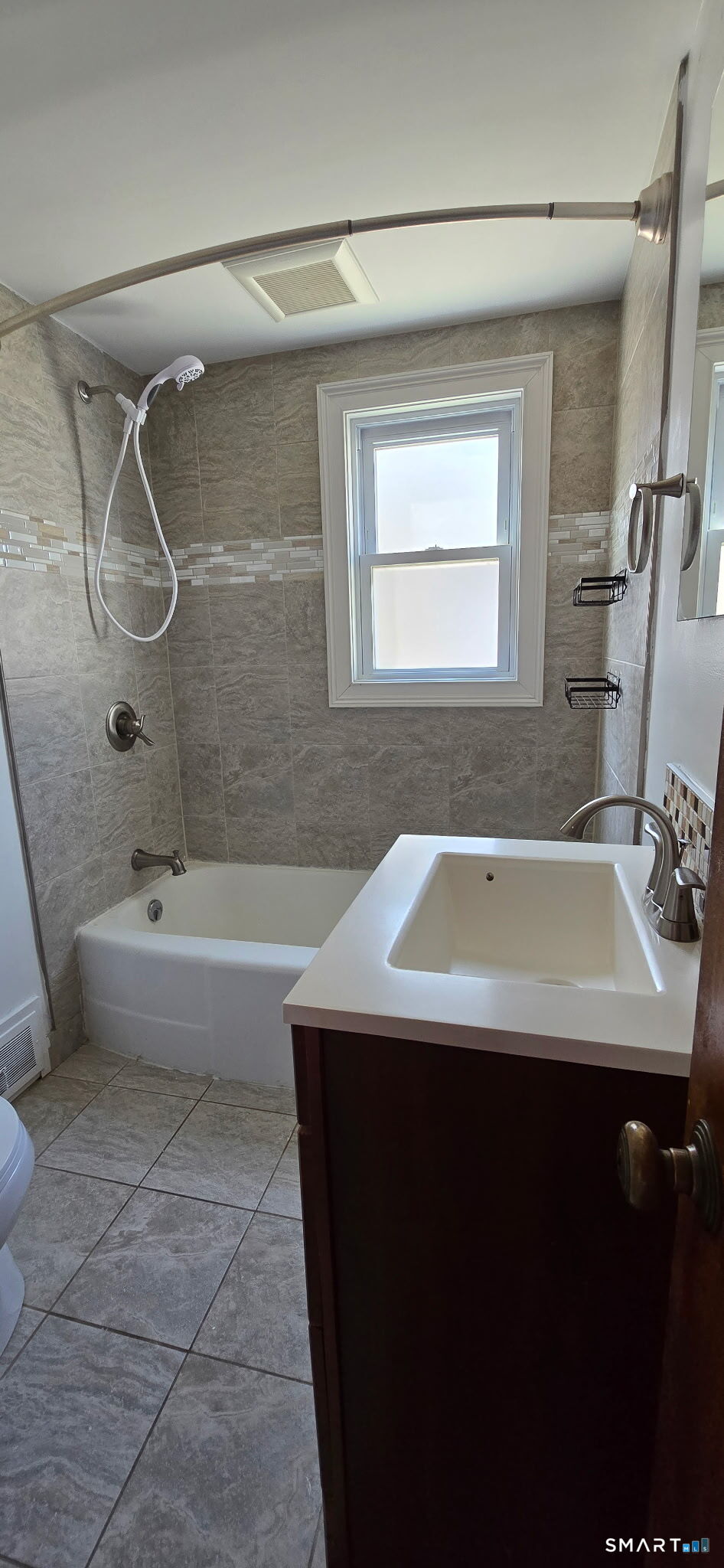 169 Arnoldale Road West Hartford, CT 06119 - Photo 8 of 11 a bathroom with a sink and a bathtub