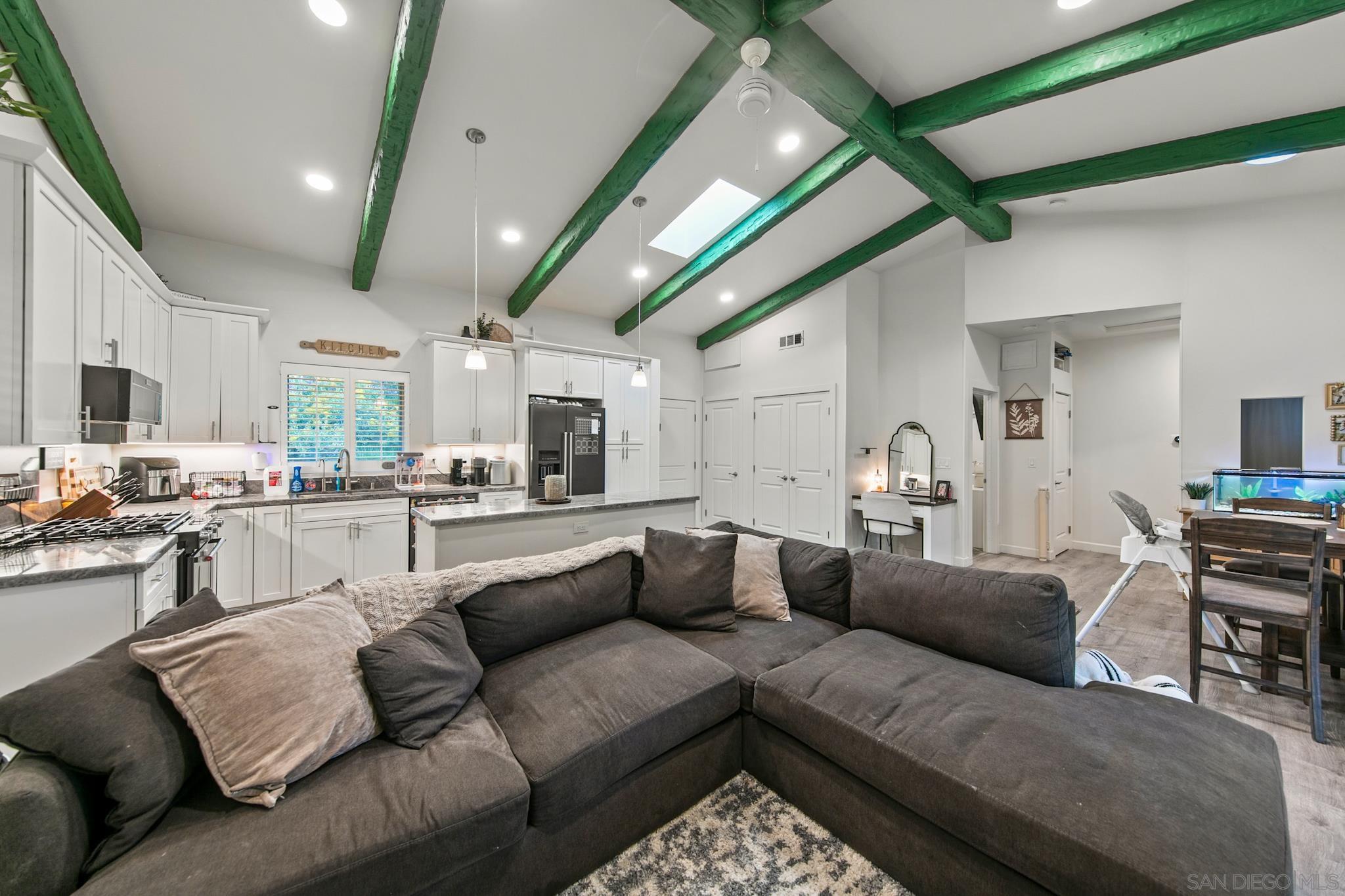 580 South Grade Road Alpine, CA 91901 - Photo 51 of 53 a living room with furniture and a view of kitchen