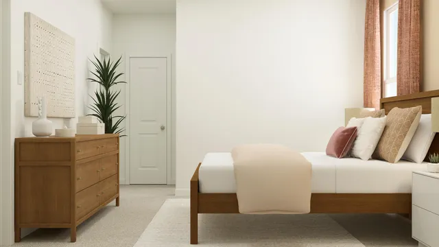 a bedroom with a bed and a potted plant