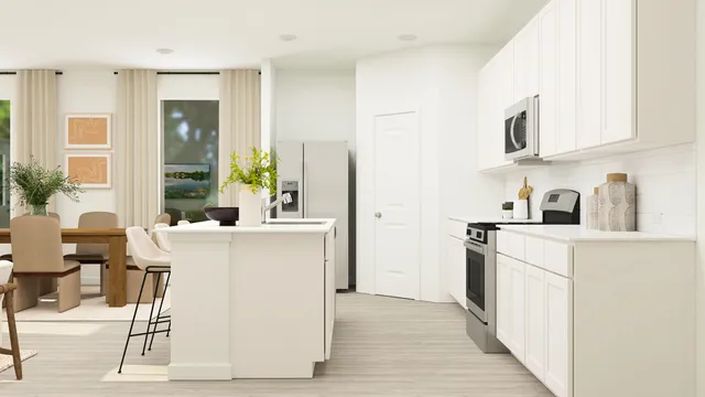 a kitchen with a sink and refrigerator