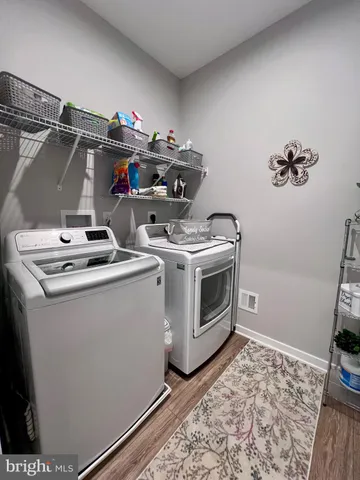 a bedroom with a bed and cabinets