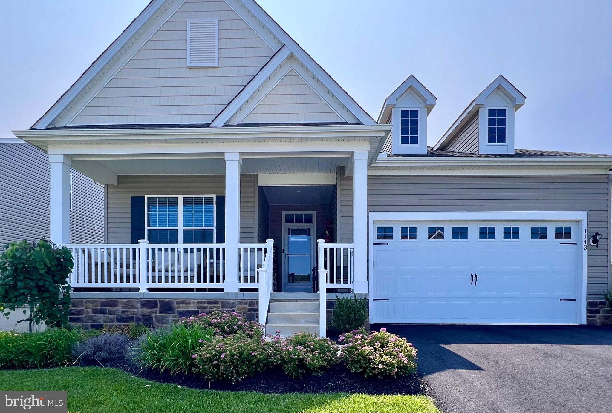 1143 Kayla Lane Townsend, DE 19734 - Photo 3 of 86 a front view of a house with garden