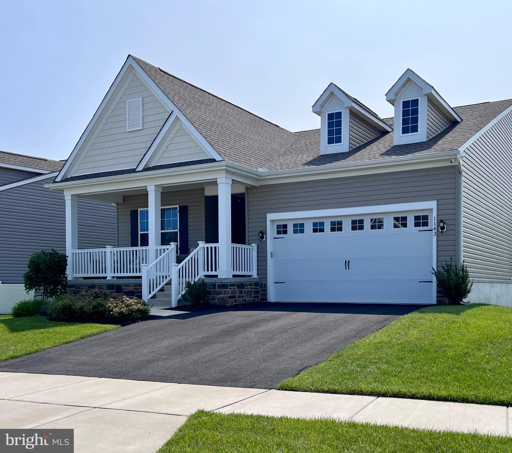 1143 Kayla Lane Townsend, DE 19734 - Photo 4 of 86 a front view of house with yard and green space