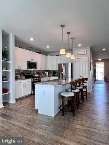 a view of front of house with a yard