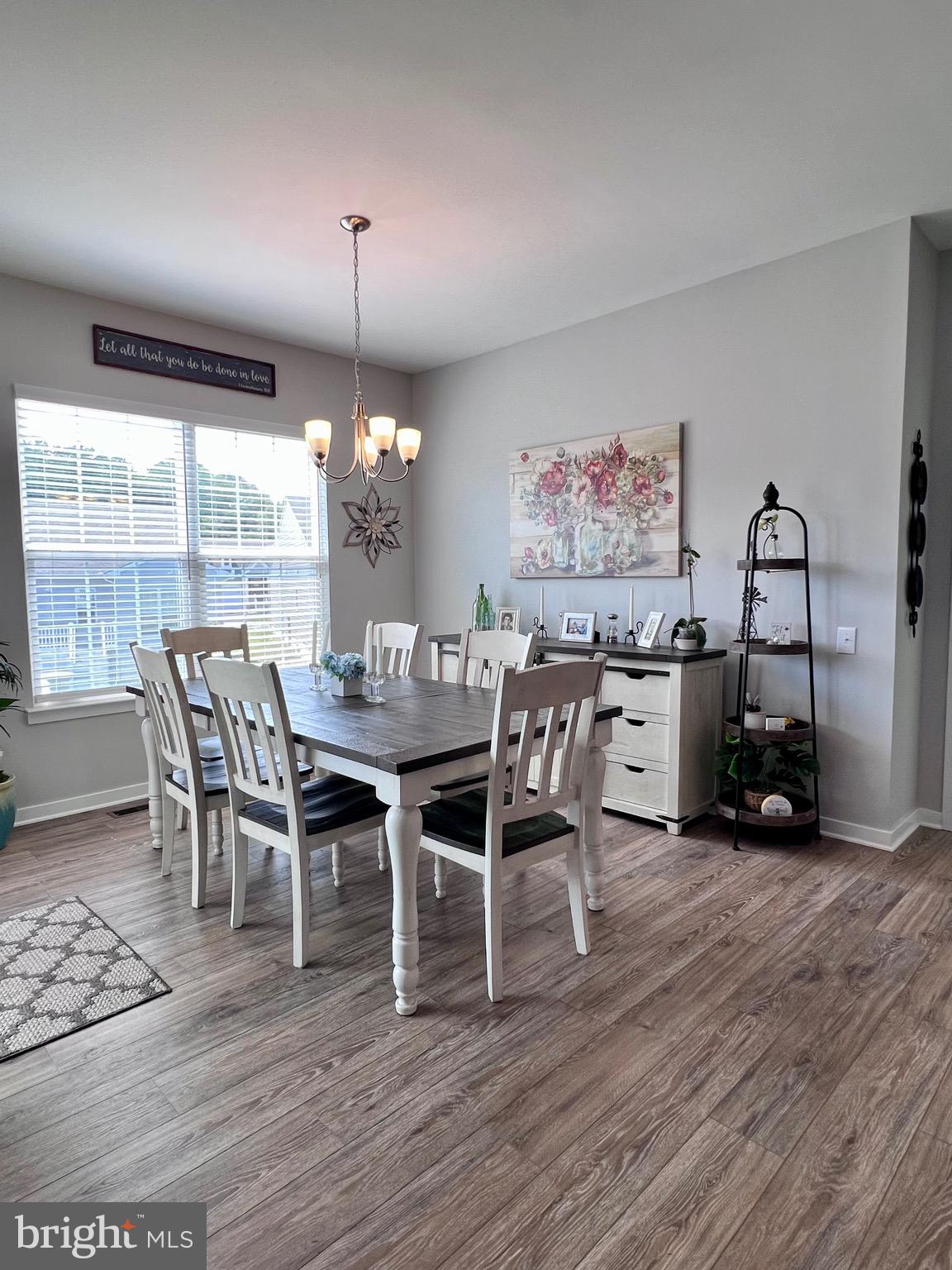 1143 Kayla Lane Townsend, DE 19734 - Photo 53 of 86 a view of a dining room with furniture window and wooden floor