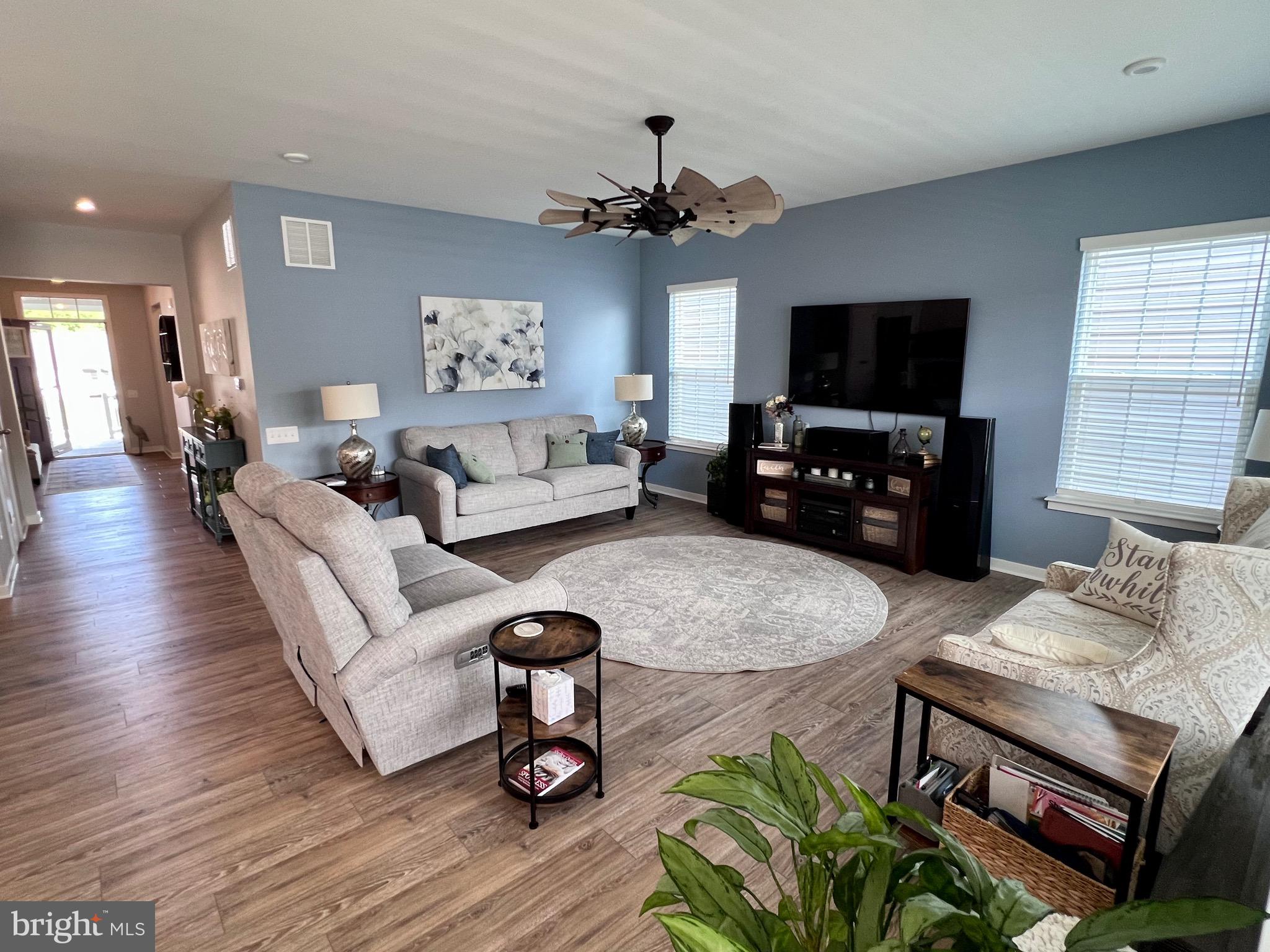 1143 Kayla Lane Townsend, DE 19734 - Photo 63 of 86 a living room with furniture a flat screen tv and a window