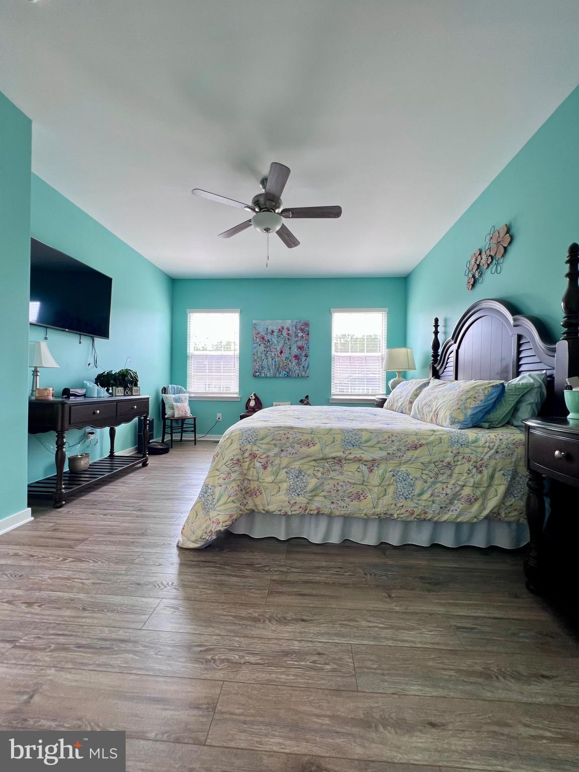1143 Kayla Lane Townsend, DE 19734 - Photo 67 of 86 a bedroom with a bed and a flat screen tv