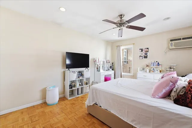 a bathroom with a sink toilet vanity and shower