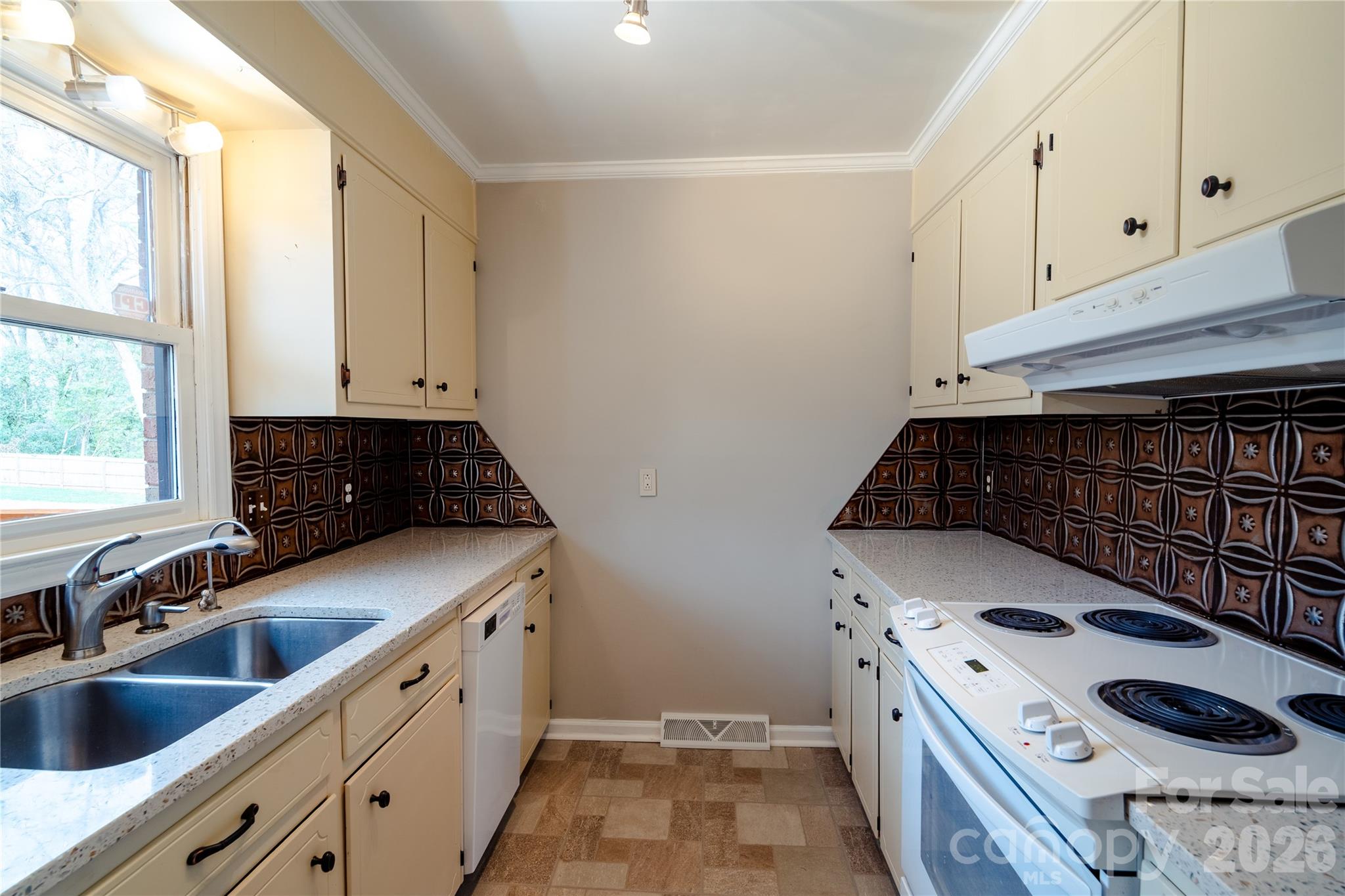 5315 Ruth Drive Charlotte, NC 28215 - Photo 29 of 38 a kitchen that has a sink and a stove