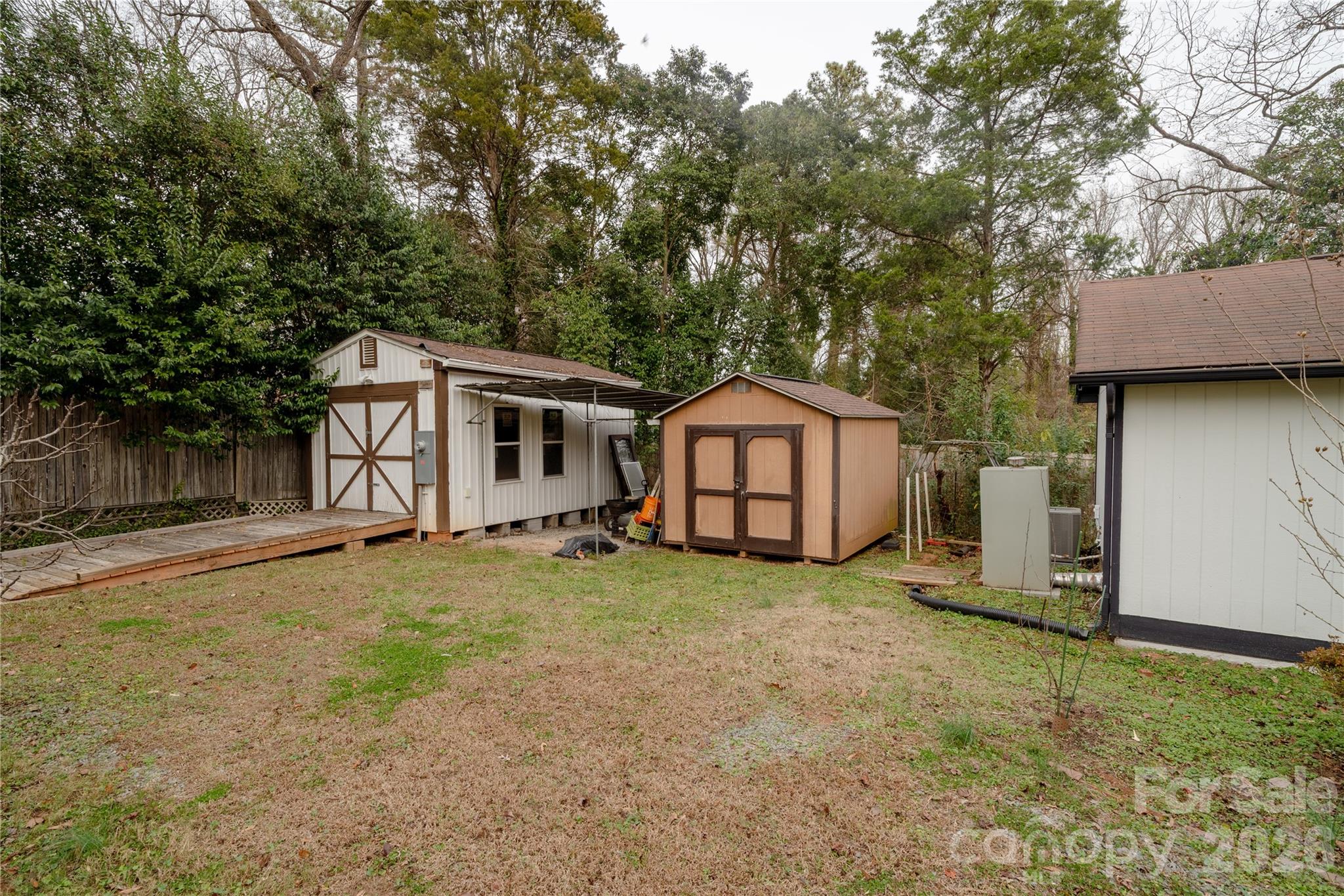 5315 Ruth Drive Charlotte, NC 28215 - Photo 35 of 38 a view of a house with a yard and large tree
