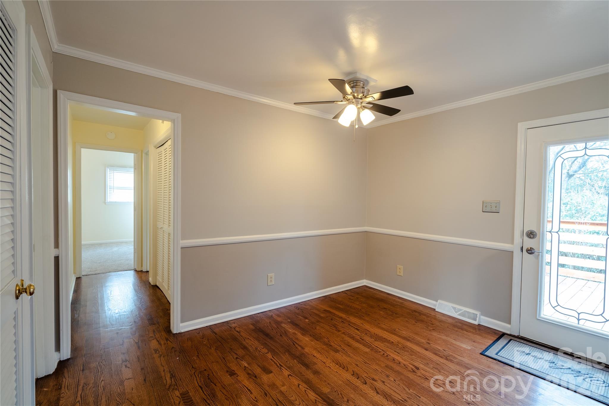 5315 Ruth Drive Charlotte, NC 28215 - Photo 10 of 38 wooden floor in an empty room with a window
