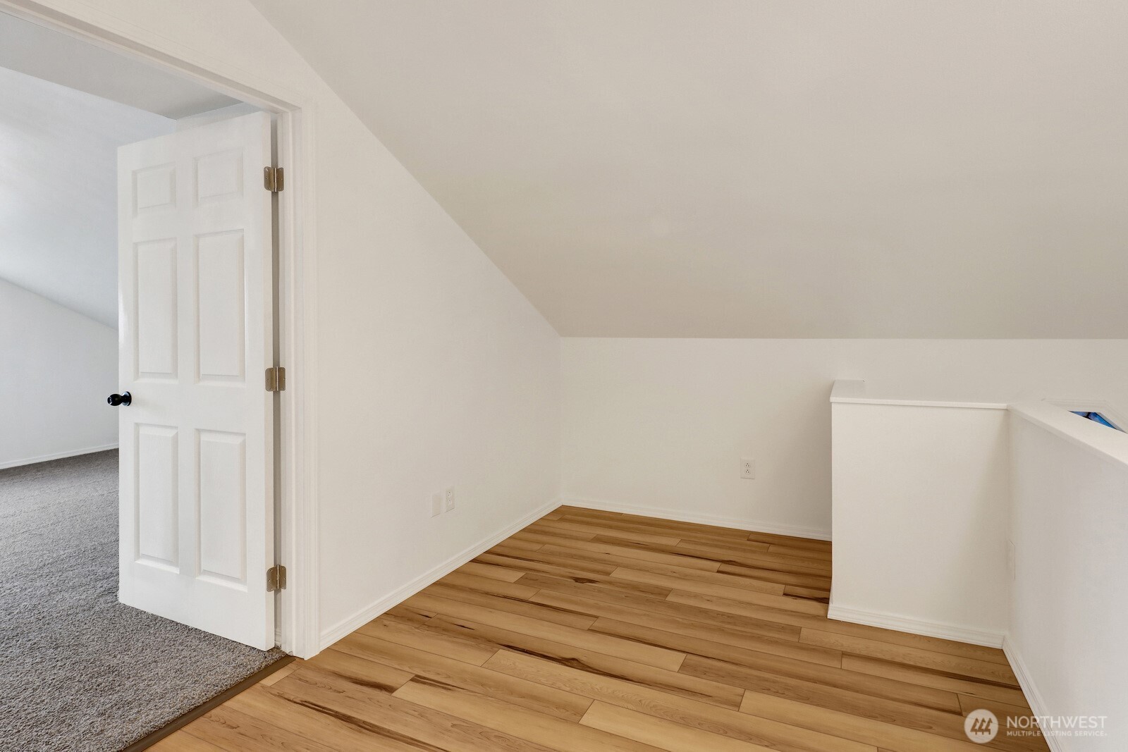 13574 South Green Street Anacortes, WA 98221 - Photo 20 of 26 a view of a closet area with wooden floor