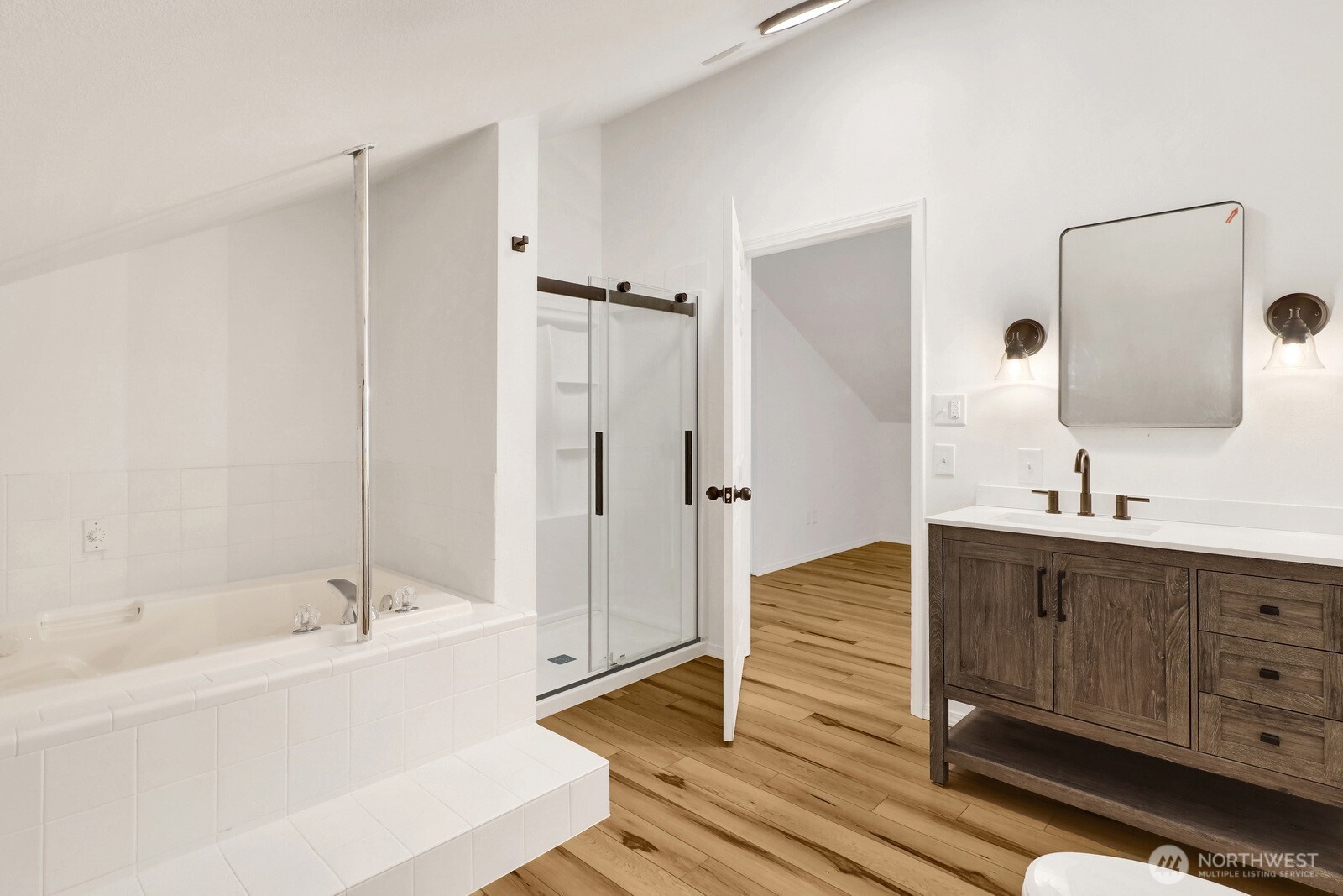 13574 South Green Street Anacortes, WA 98221 - Photo 22 of 26 a bathroom with a bathtub and a sink