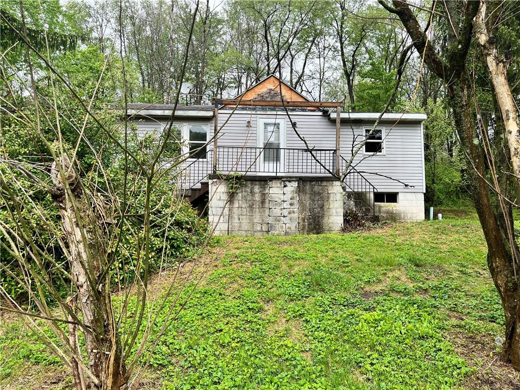 2302 Hunter Road Greensburg, PA 15601 - Photo 1 of 8 a house view with a garden space
