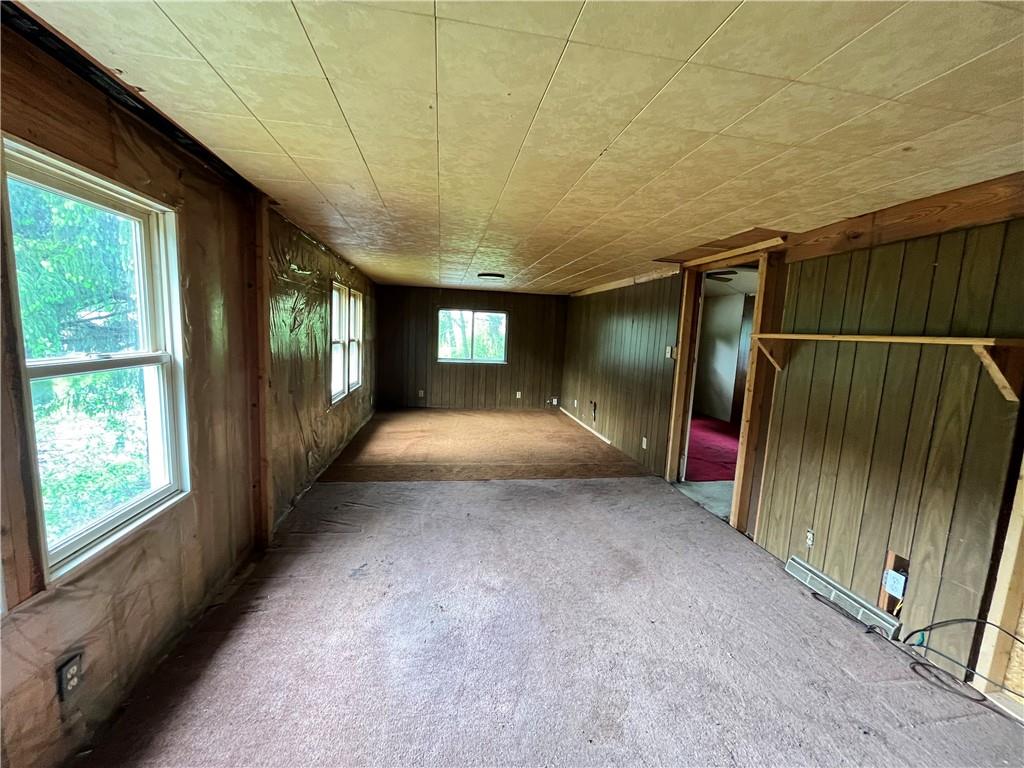 2302 Hunter Road Greensburg, PA 15601 - Photo 3 of 8 a view of hallway with stairs and wooden floor