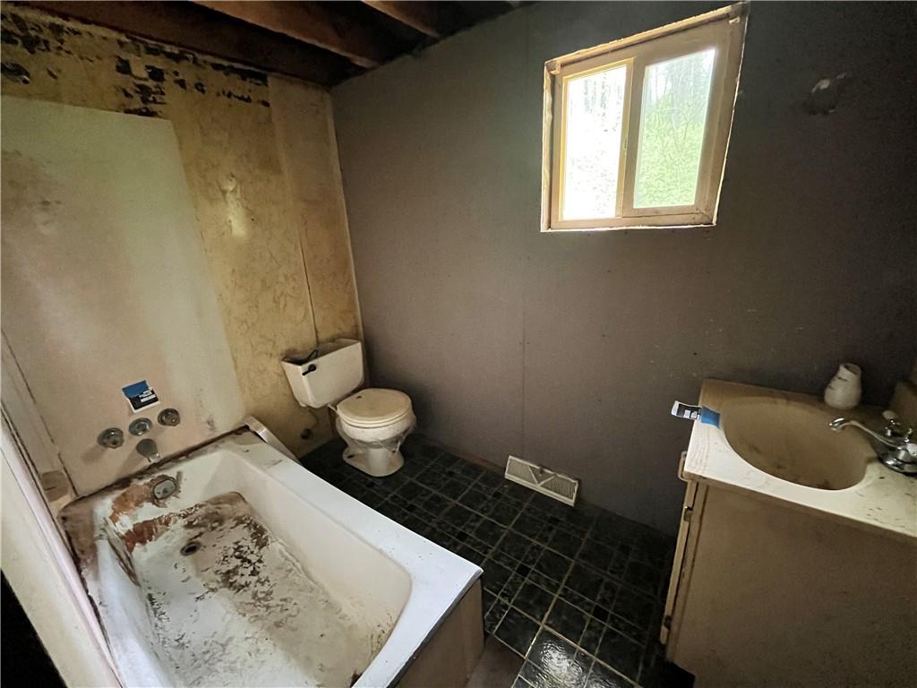 2302 Hunter Road Greensburg, PA 15601 - Photo 8 of 8 a bathroom with a sink toilet and shower