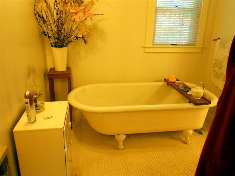 5001 Takilma Road Cave Junction, OR 97523 - Photo 16 of 27 claw footed tub in master bath room
