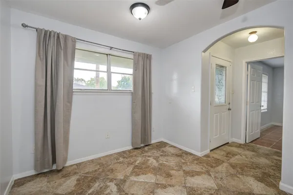 a view of an empty room and window