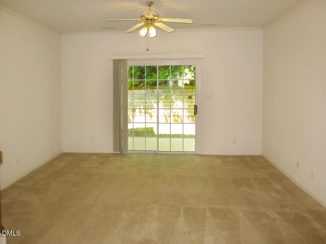 101 Rock Haven Road, Unit E502 Carrboro, NC 27510 - Photo 3 of 16 a view of an empty room with a window