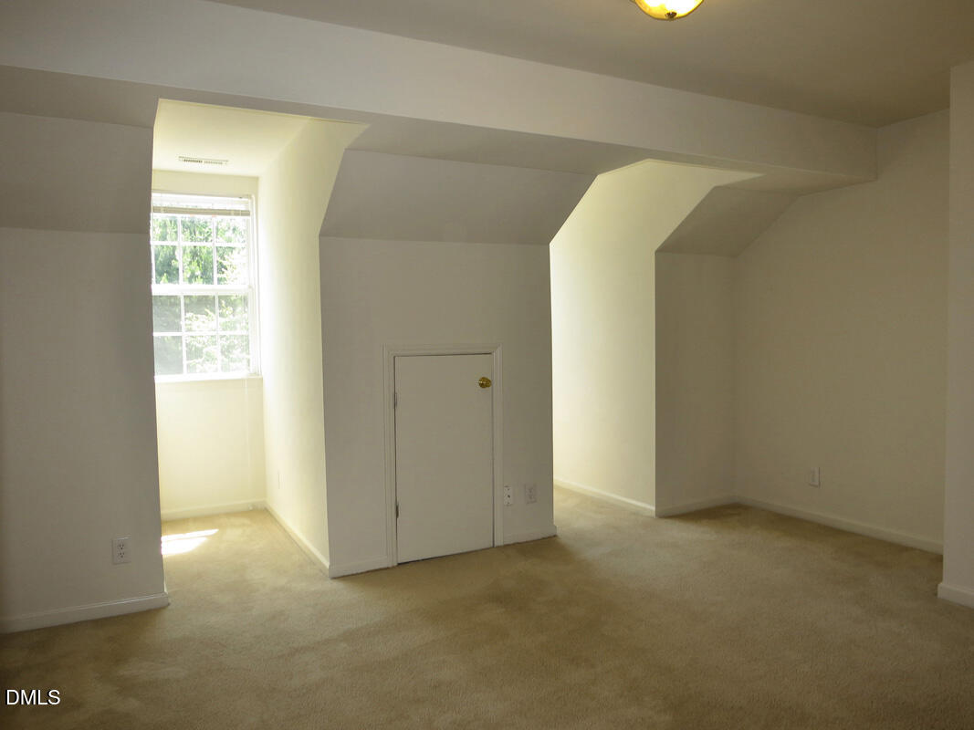 101 Rock Haven Road, Unit E502 Carrboro, NC 27510 - Photo 8 of 16 an empty room with windows