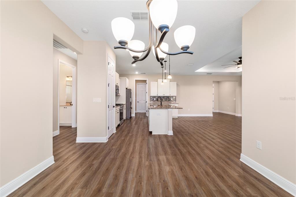 9778 Southwest 103rd Avenue Ocala, FL 34481 - Photo 21 of 57 a view of a room with wooden floor