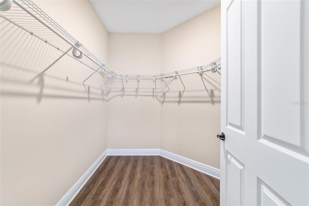 9778 Southwest 103rd Avenue Ocala, FL 34481 - Photo 38 of 57 a view of a room with racks on the wall