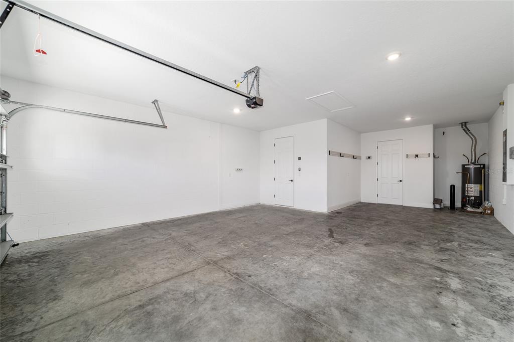 9778 Southwest 103rd Avenue Ocala, FL 34481 - Photo 47 of 57 a view of a big room with a ceiling fan