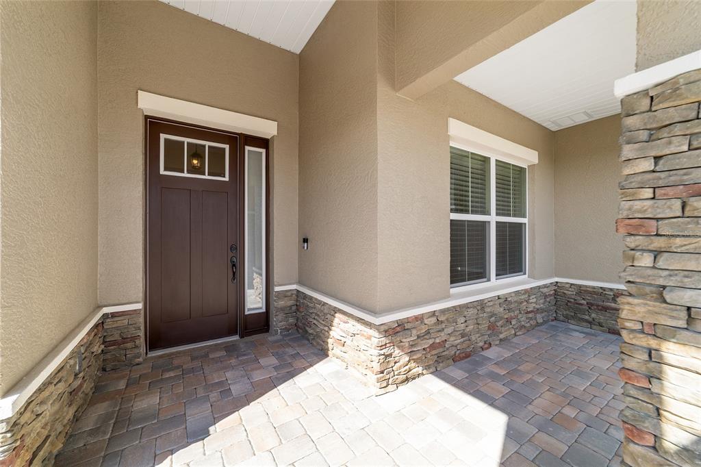 9778 Southwest 103rd Avenue Ocala, FL 34481 - Photo 9 of 57 a bedroom with a bed and a window