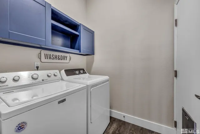 a view of storage and utility room with washer and dryer