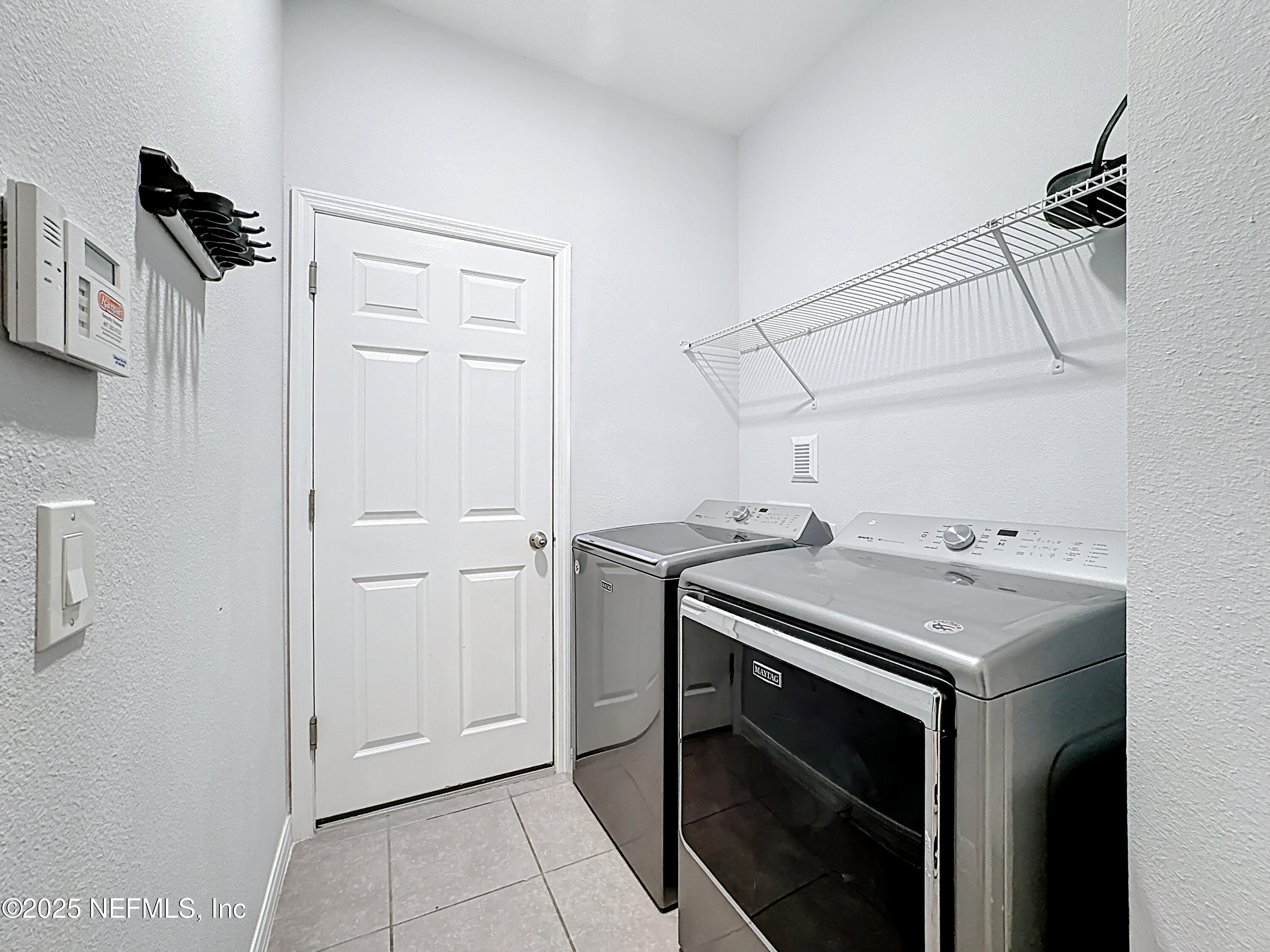 3473 Middlebrook Place St. Cloud, FL 34773 - Photo 22 of 32 a utility room with dryer and washer