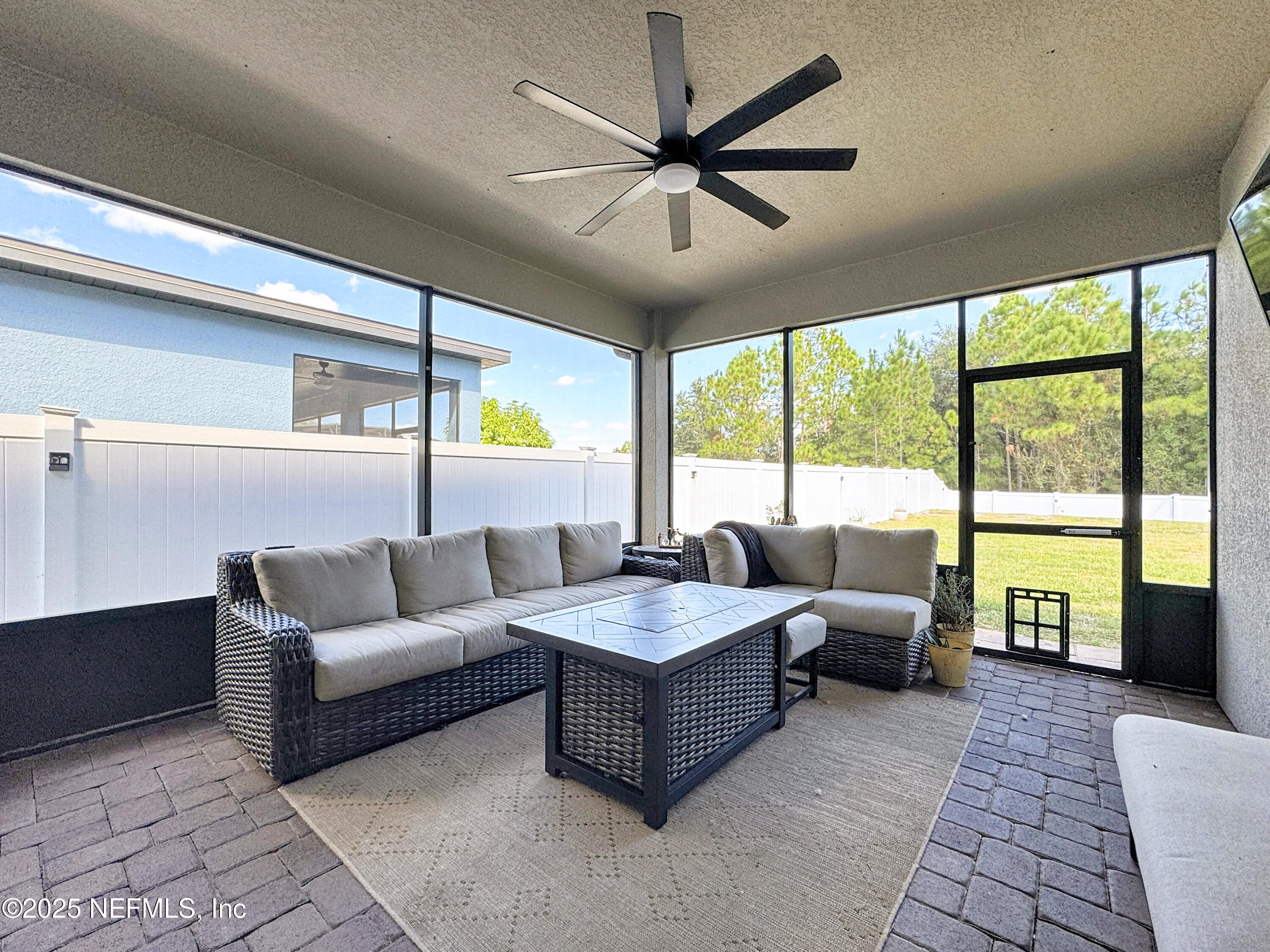3473 Middlebrook Place St. Cloud, FL 34773 - Photo 24 of 32 a living room with furniture and a large window