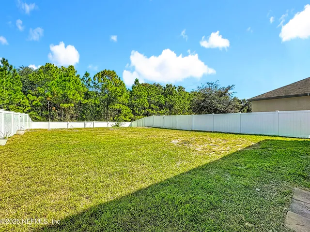 a view of an outdoor space and a yard