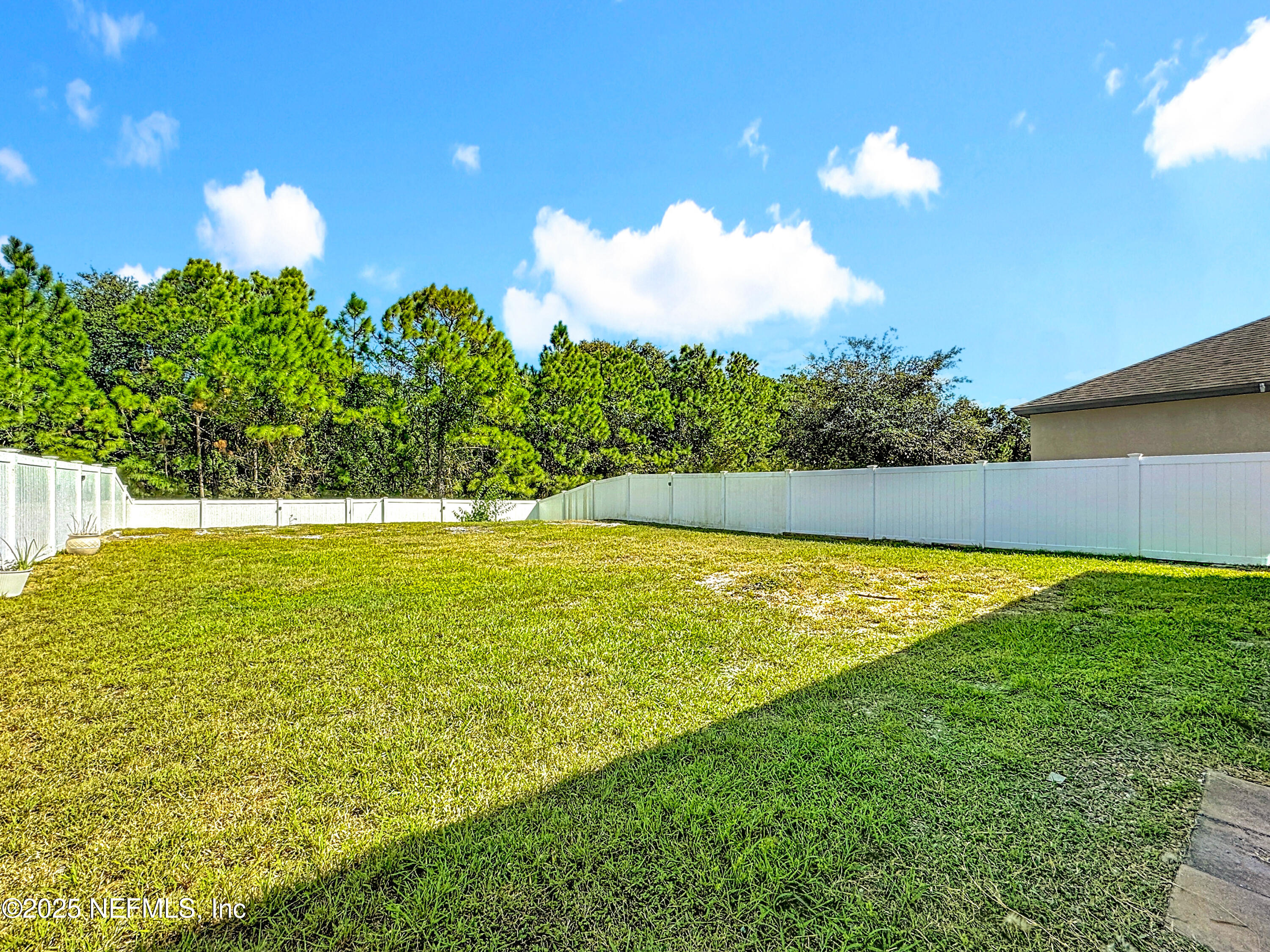 3473 Middlebrook Place St. Cloud, FL 34773 - Photo 25 of 32 a view of an outdoor space and a yard