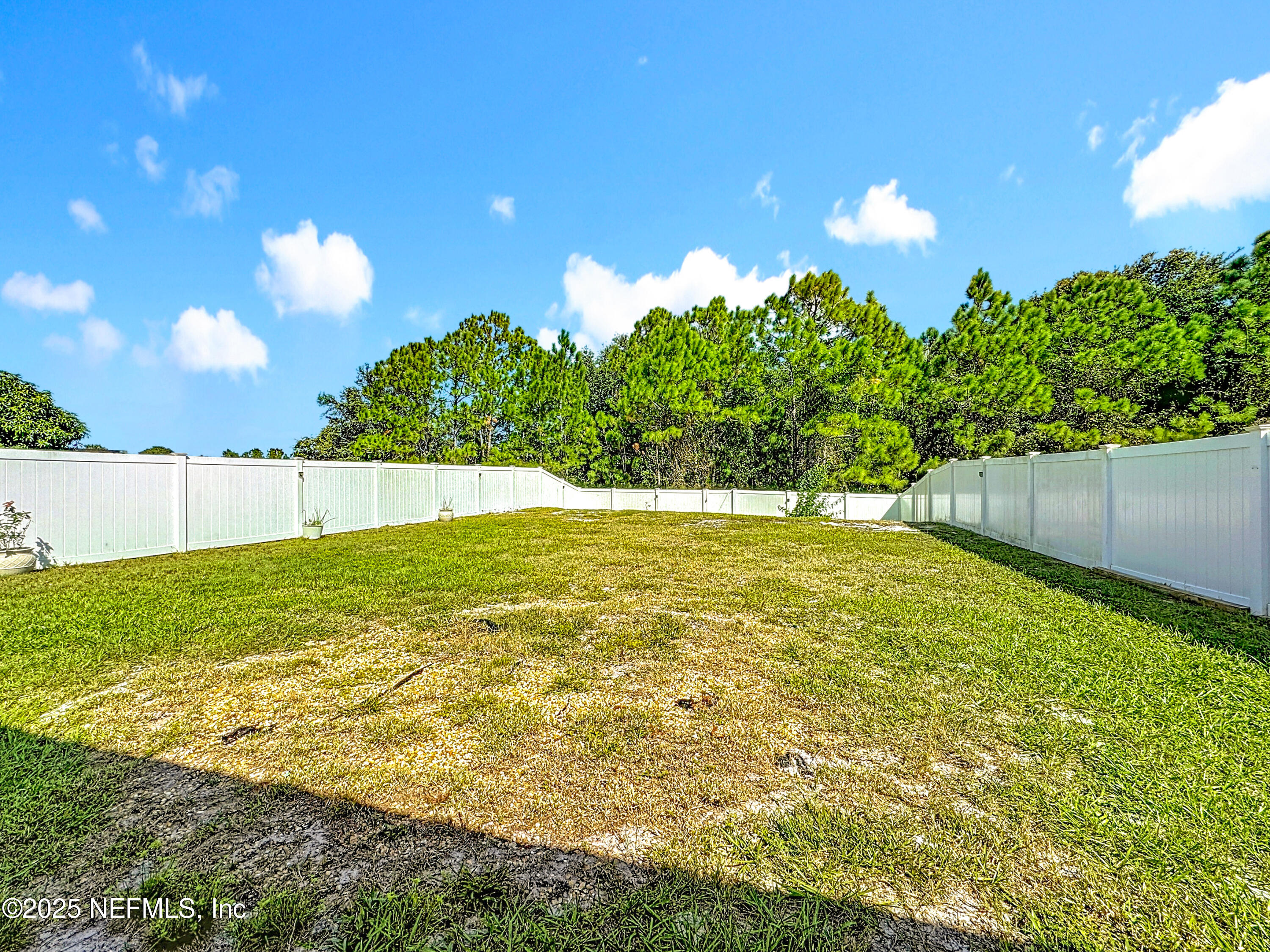 3473 Middlebrook Place St. Cloud, FL 34773 - Photo 26 of 32 a view of an outdoor space and a yard