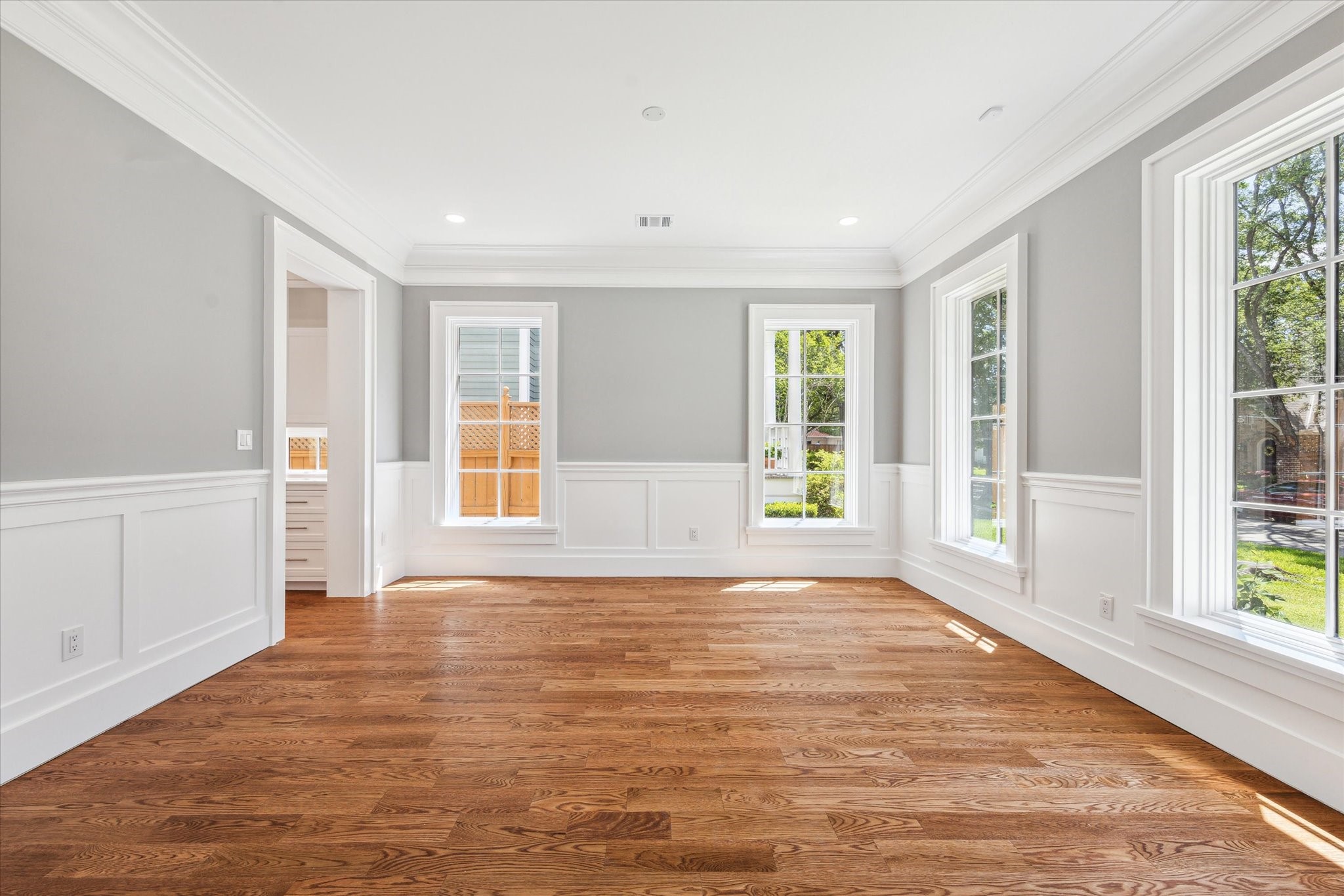 2216 Tangley Street Houston, TX 77005 - Photo 31 of 44 Another view of the dining room--notice the high ceilings beautiful hardwood floors and crown molding and wainscotting!