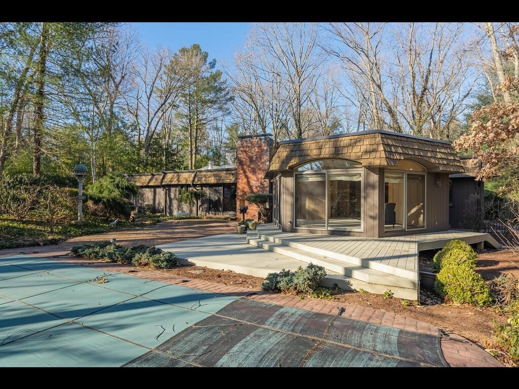 321 Ardsley Road Longmeadow, MA 01106 - Photo 11 of 42 a view of a house with a yard and sitting area