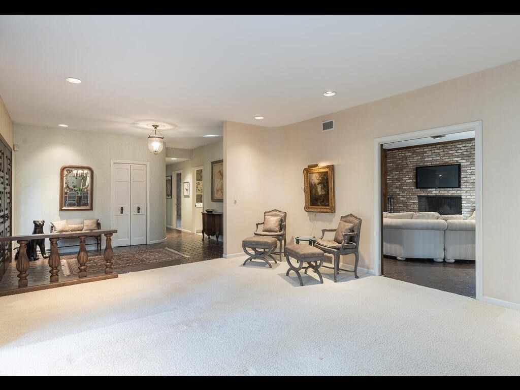 321 Ardsley Road Longmeadow, MA 01106 - Photo 15 of 42 a living room with furniture and a flat screen tv