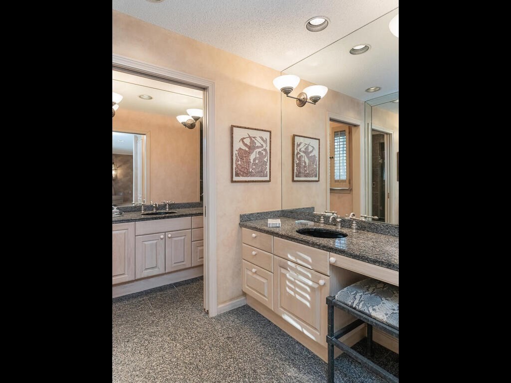 321 Ardsley Road Longmeadow, MA 01106 - Photo 28 of 42 a spacious bathroom with a granite countertop sink a toilet and mirror