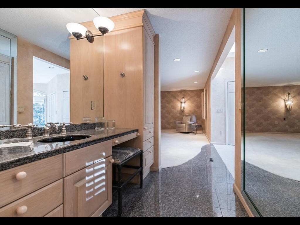 321 Ardsley Road Longmeadow, MA 01106 - Photo 29 of 42 a bathroom with a sink and a mirror