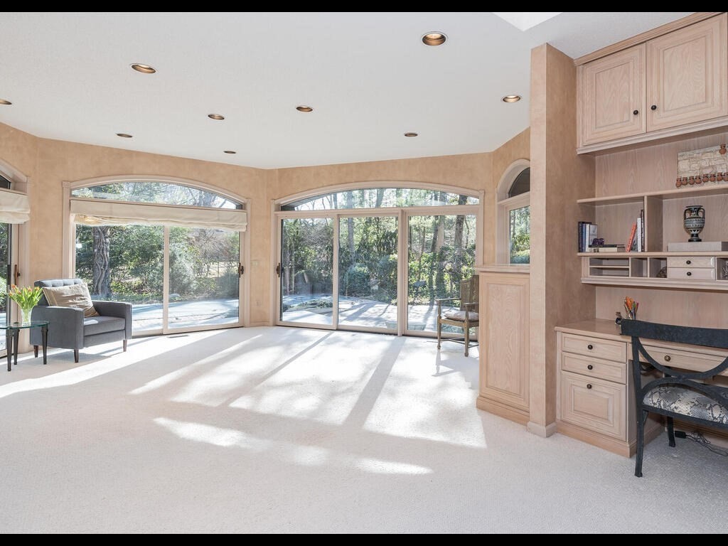 321 Ardsley Road Longmeadow, MA 01106 - Photo 32 of 42 a spacious bathroom with a large window and a bath tub