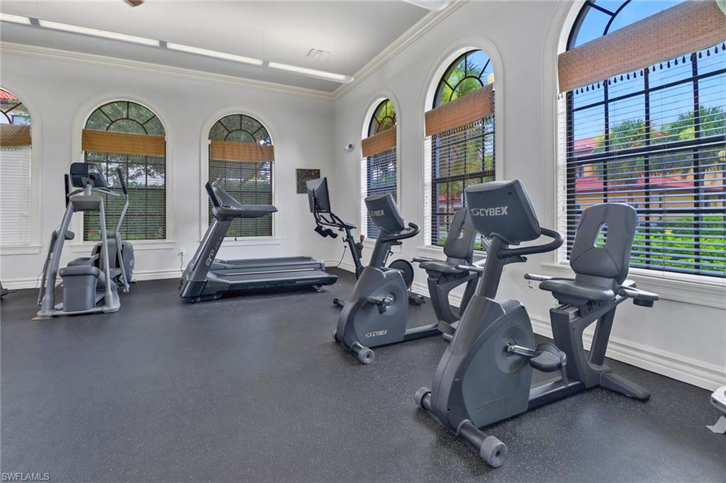 1326 Corso Palermo Court, Unit 3 Naples, FL 34105 - Photo 28 of 33 a view of gym equipment with windows