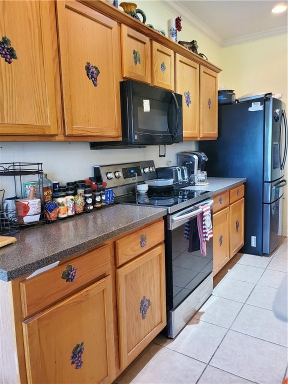 2602 Whirlwind Street Corpus Christi, TX 78414 - Photo 5 of 9 a kitchen with stainless steel appliances granite countertop a stove a sink and a microwave