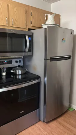 a close view of a stove top oven and sitting space