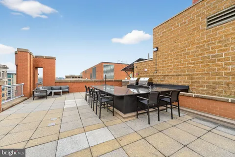 a view of a terrace with seating area