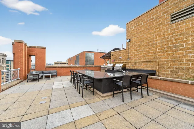 a view of a terrace with seating area