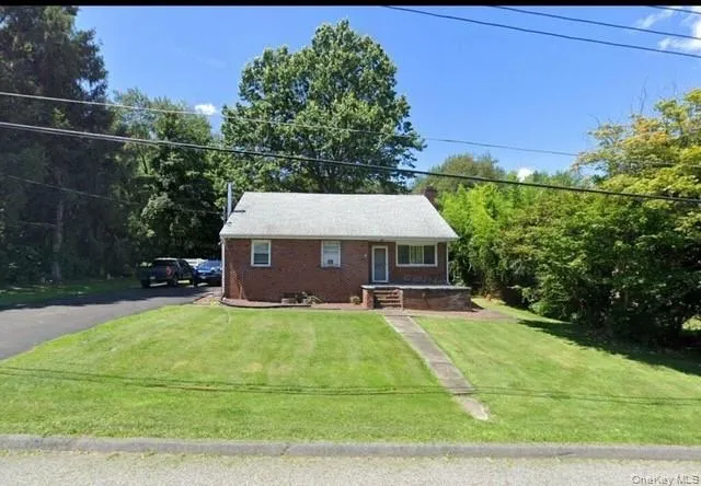 a kitchen with stainless steel appliances a refrigerator and microwave