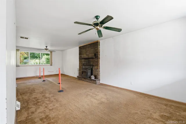 a living room with a fireplace