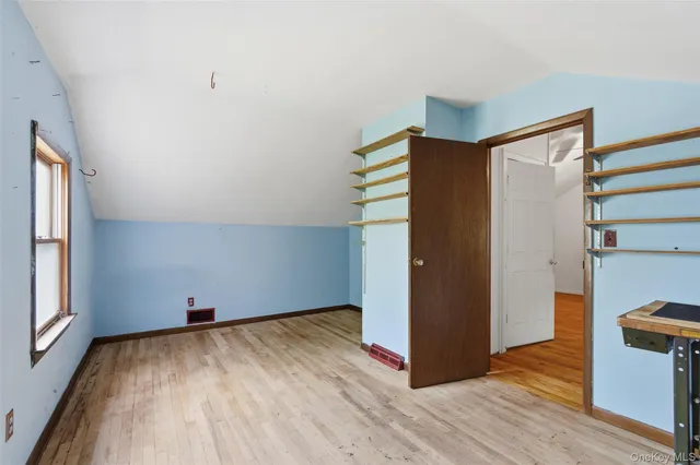 a view of a yard in front view of a house