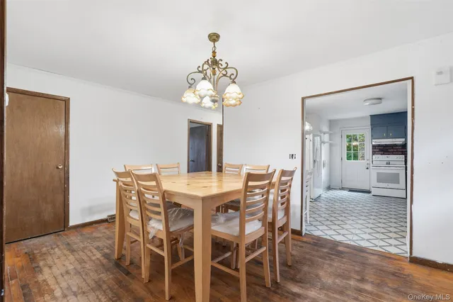 a bathroom with a sink toilet and mirror